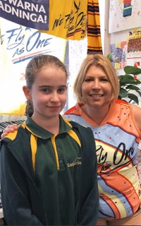 NewsPortrait Term2 Seinna Mrs Keizia Guernsey Design Comp.jpg Seinna with her teacher Mrs Keizer was a winner in Term 2